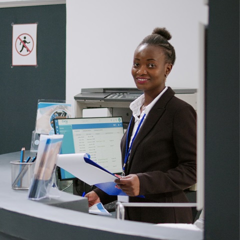 healthcare team with id badges stand outdoor